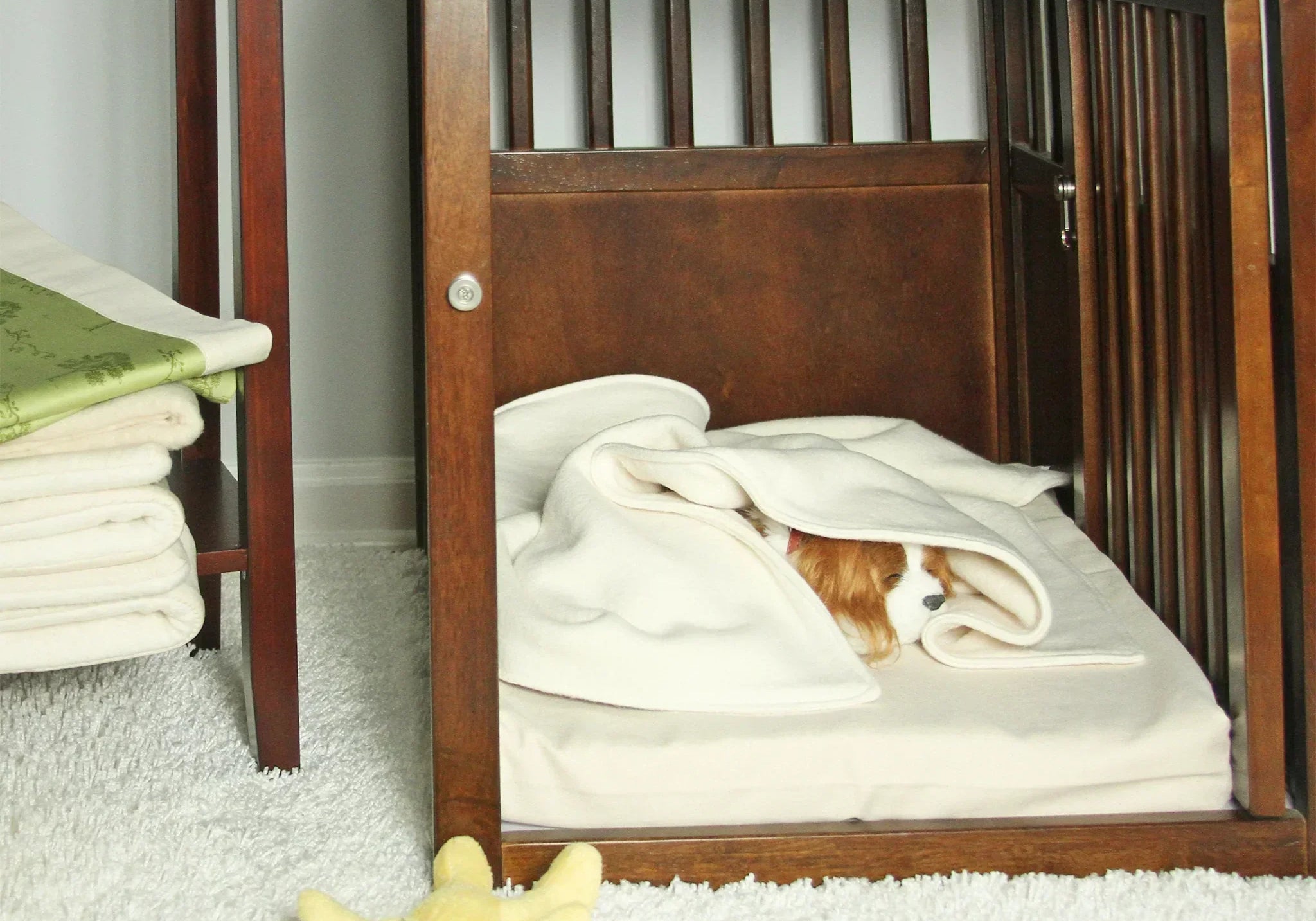 Puppy Sleeping in a crate with organic cotton mat and blanket