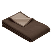 brown dog blanket folded, showing lighter side in corner