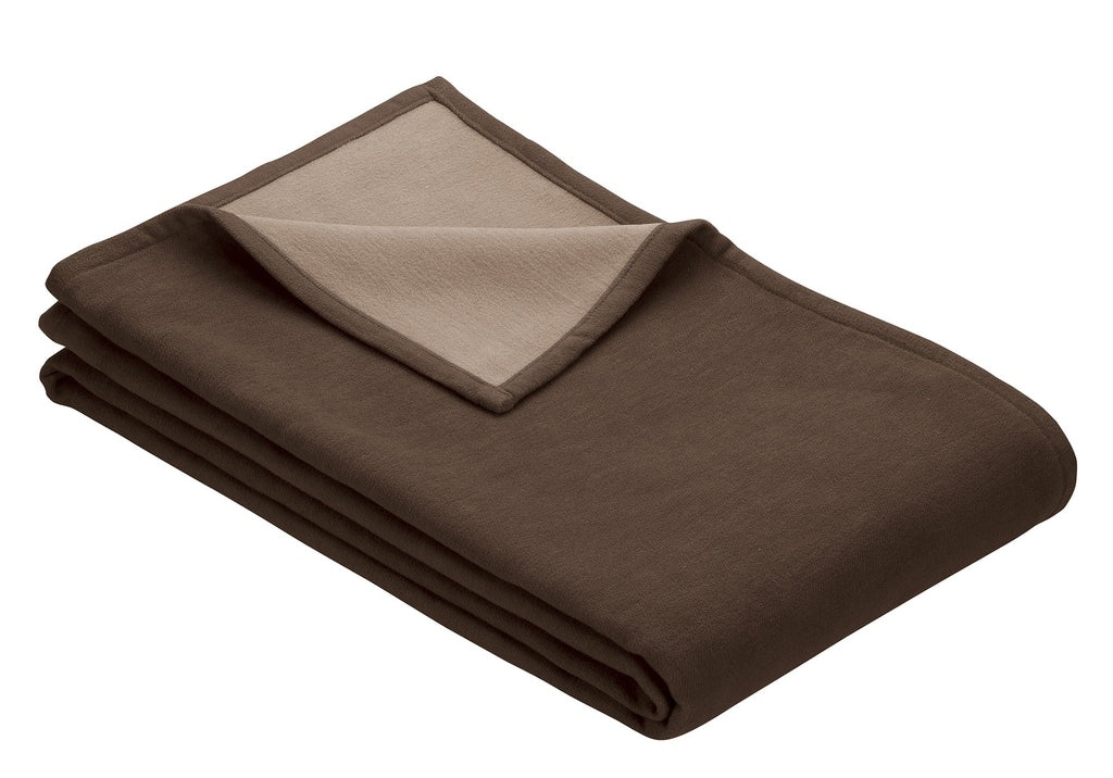 brown dog blanket folded, showing lighter side in corner