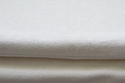 two dog mats covers in natural fleece close up