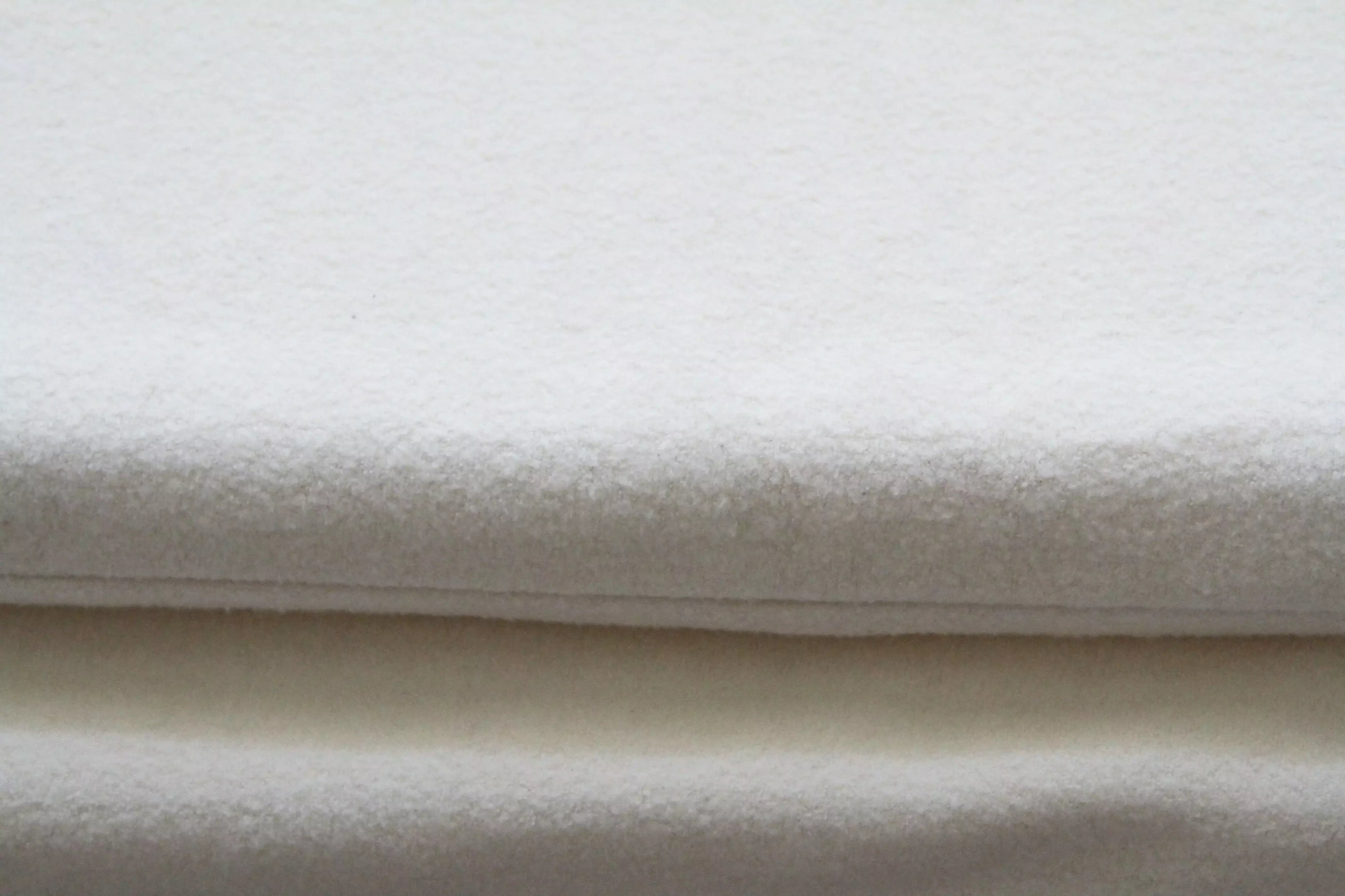 two dog mats covers in natural fleece close up