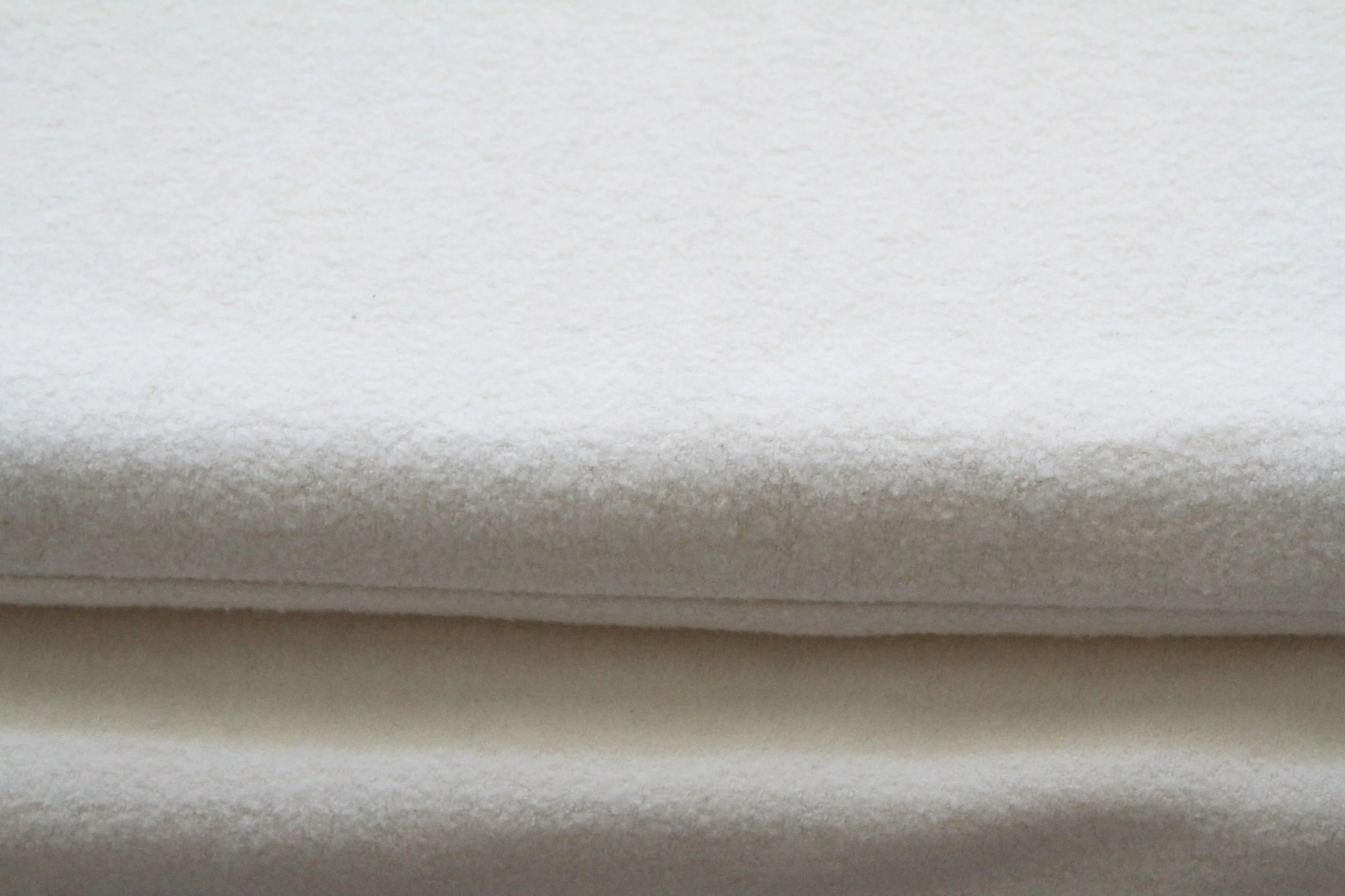 two dog mats covers in natural fleece close up